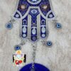 Evil eye hanging with hamsa hand