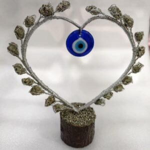 Handcrafted crystal heart with an Evil Eye centerpiece