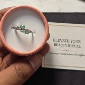 Emerald adjusted ring