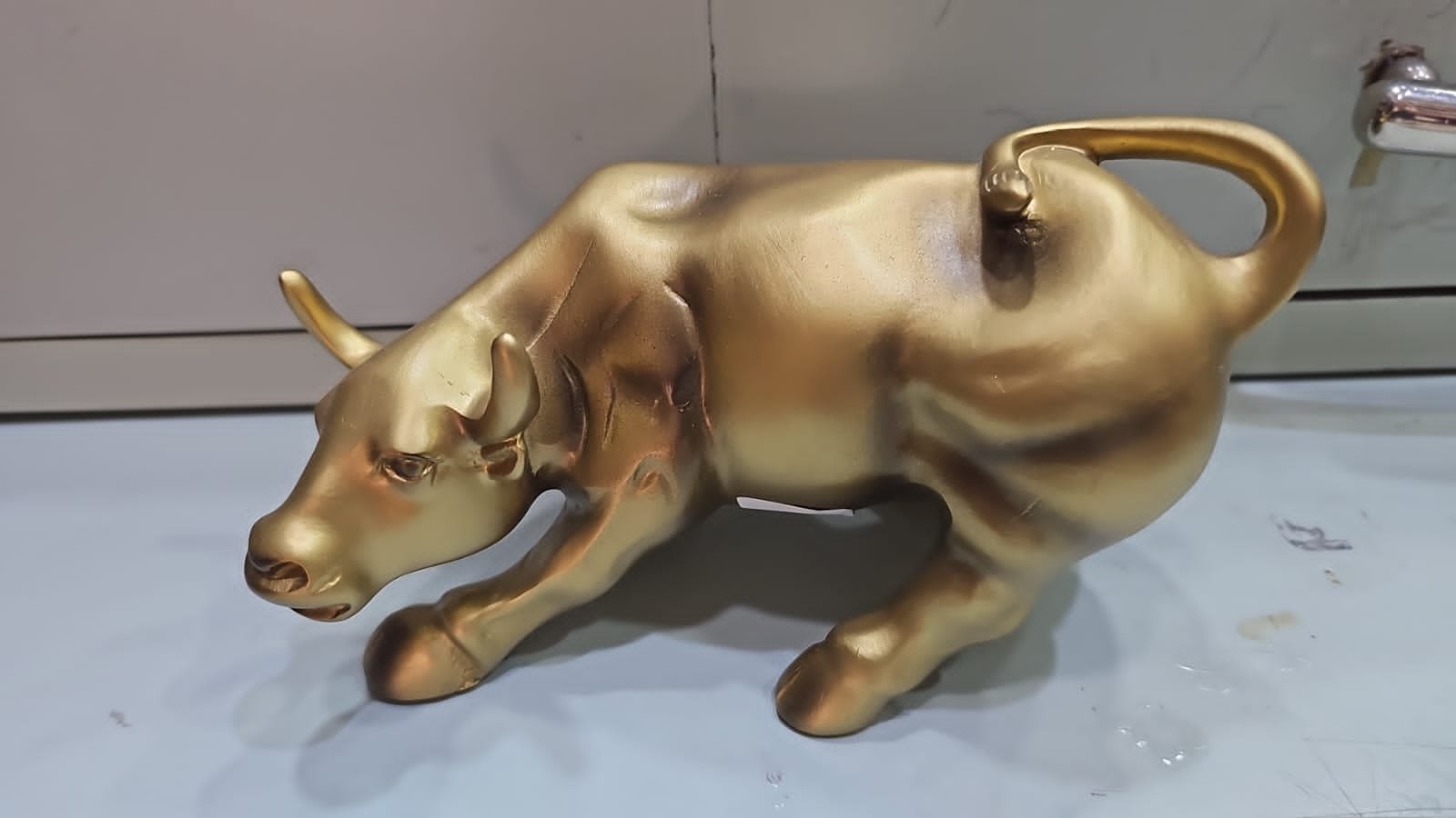 WhatsApp Image 2026-07-13 at 4.39.32 AM Golden Charging Bull